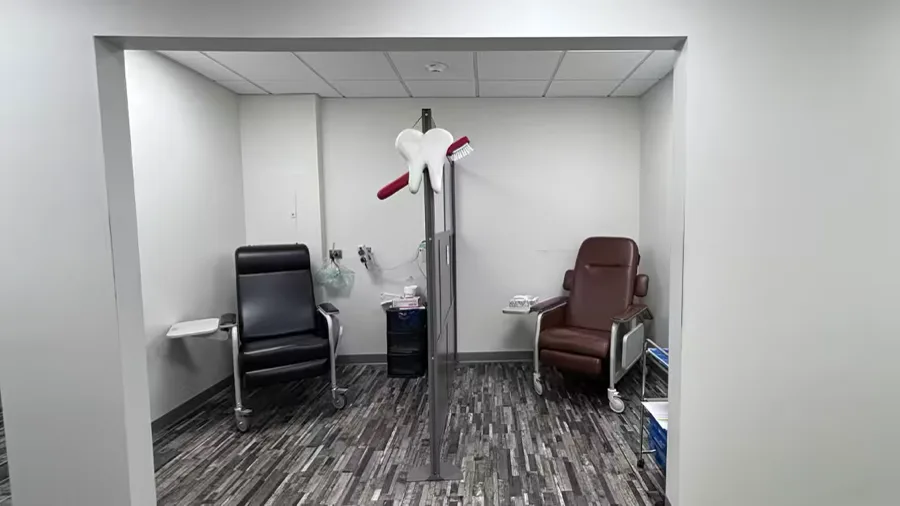 Hallway leading to treatment suites at Norwell Oral Surgery